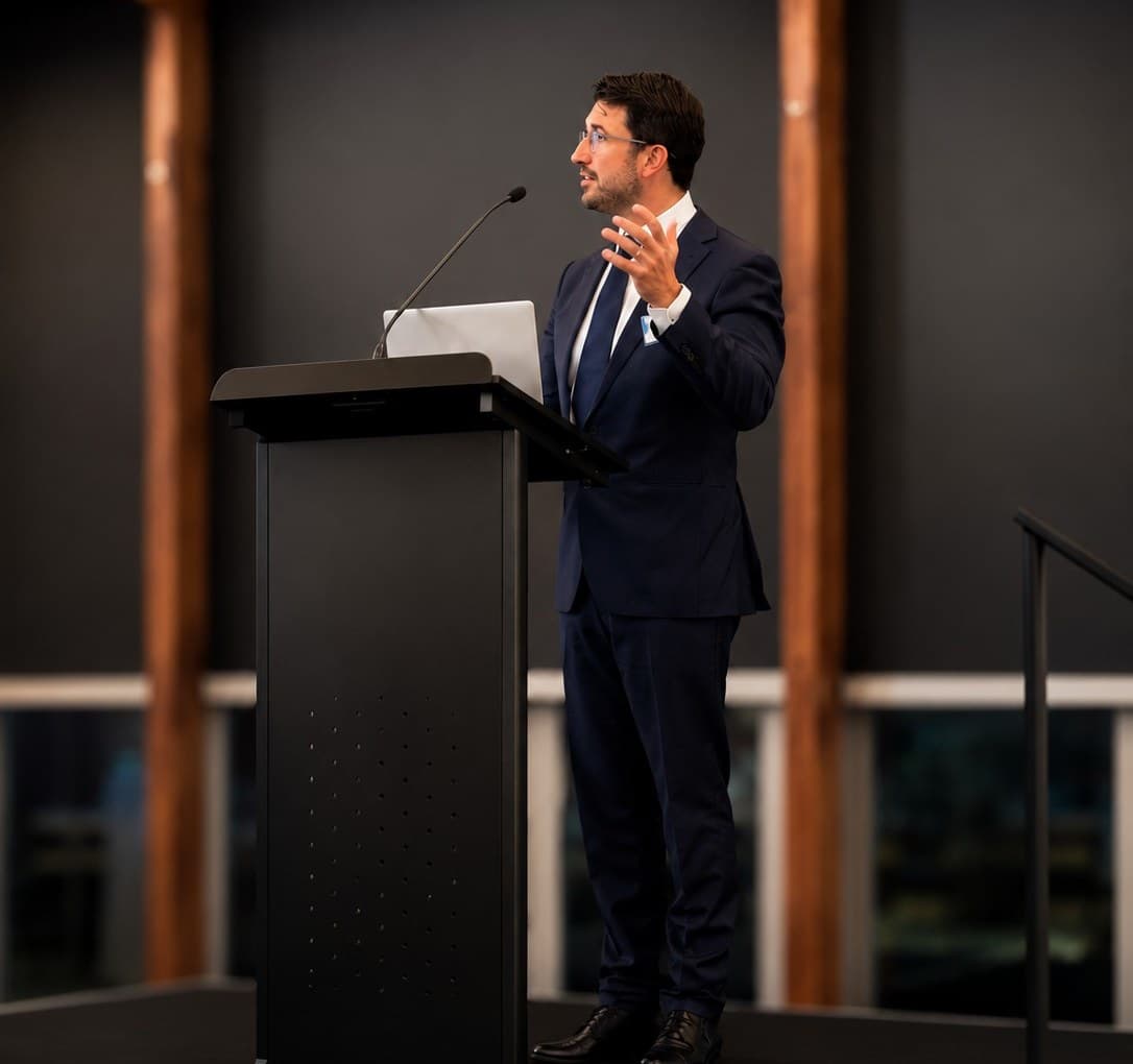 Phillip Almeida speaking at an event